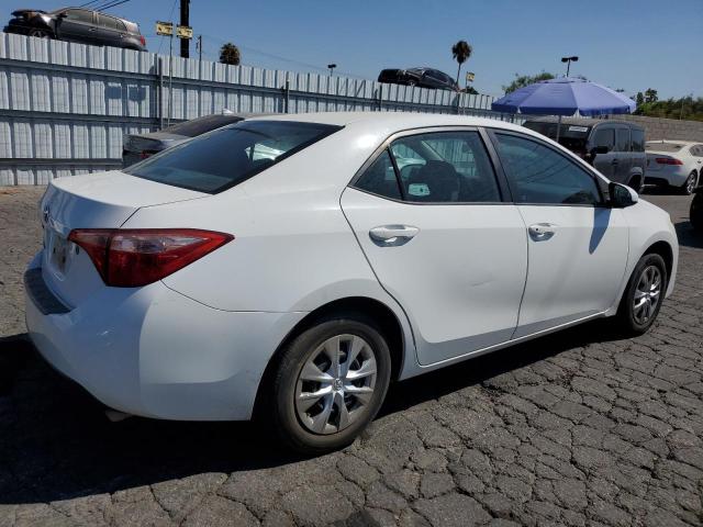 Photo 2 VIN: 5YFBURHE9HP693461 - TOYOTA COROLLA L 