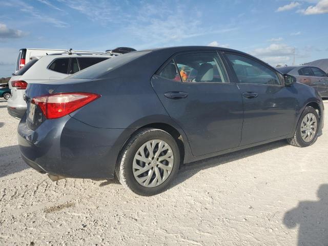 Photo 2 VIN: 5YFBURHE9HP697462 - TOYOTA COROLLA L 