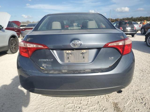 Photo 5 VIN: 5YFBURHE9HP697462 - TOYOTA COROLLA L 