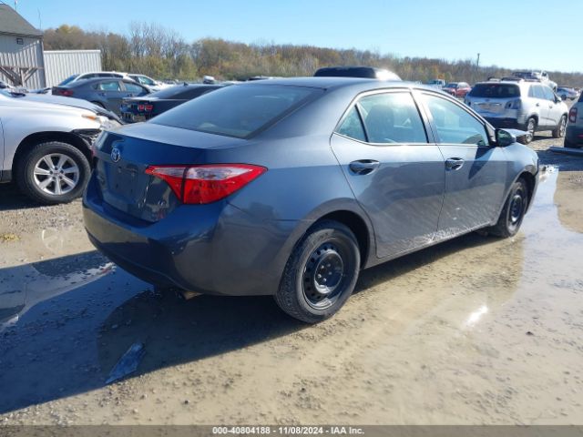 Photo 3 VIN: 5YFBURHE9HP699213 - TOYOTA COROLLA 