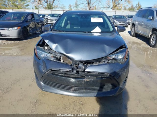 Photo 5 VIN: 5YFBURHE9HP699213 - TOYOTA COROLLA 