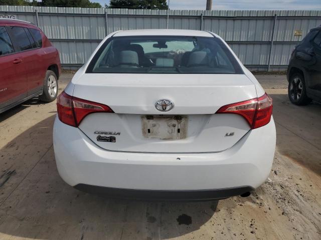 Photo 5 VIN: 5YFBURHE9HP709853 - TOYOTA COROLLA L 