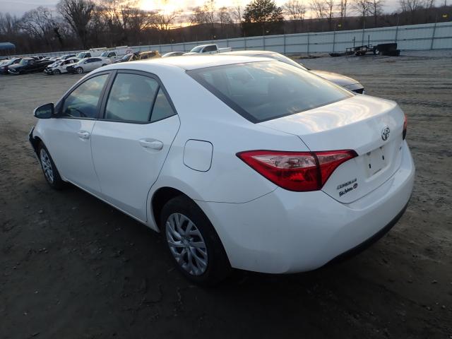 Photo 2 VIN: 5YFBURHE9HP714583 - TOYOTA COROLLA L 