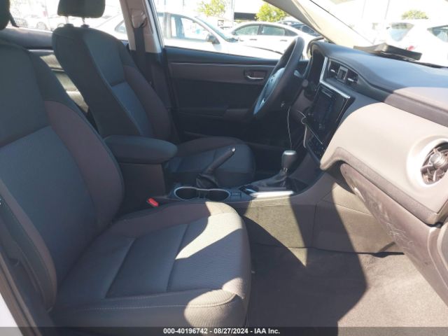 Photo 4 VIN: 5YFBURHE9JP748027 - TOYOTA COROLLA 