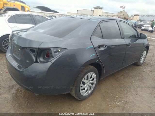 Photo 3 VIN: 5YFBURHE9JP749503 - TOYOTA COROLLA 