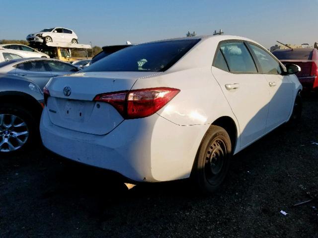 Photo 3 VIN: 5YFBURHE9JP749971 - TOYOTA COROLLA L 