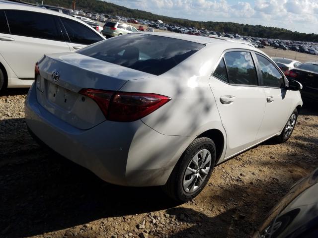 Photo 3 VIN: 5YFBURHE9JP761246 - TOYOTA COROLLA L 