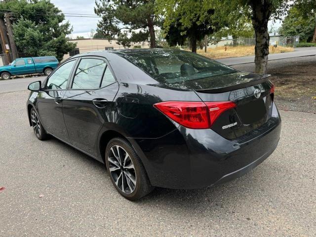 Photo 2 VIN: 5YFBURHE9JP771050 - TOYOTA COROLLA L 