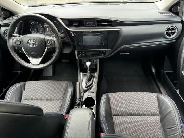 Photo 8 VIN: 5YFBURHE9JP771050 - TOYOTA COROLLA L 