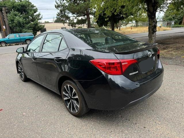 Photo 2 VIN: 5YFBURHE9JP771050 - TOYOTA COROLLA L 