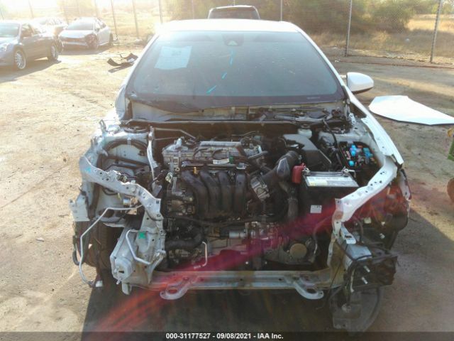 Photo 5 VIN: 5YFBURHE9JP778080 - TOYOTA COROLLA 