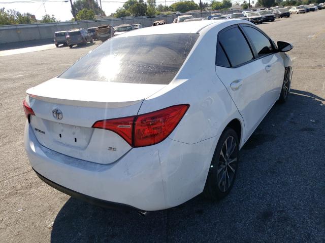 Photo 3 VIN: 5YFBURHE9JP783246 - TOYOTA COROLLA L 