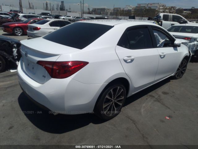 Photo 3 VIN: 5YFBURHE9JP784459 - TOYOTA COROLLA 