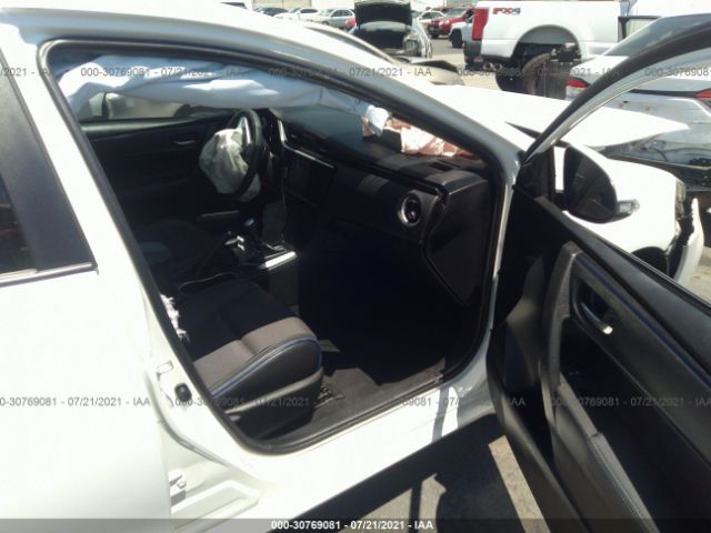 Photo 4 VIN: 5YFBURHE9JP784459 - TOYOTA COROLLA 