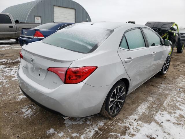 Photo 3 VIN: 5YFBURHE9JP790231 - TOYOTA COROLLA L 