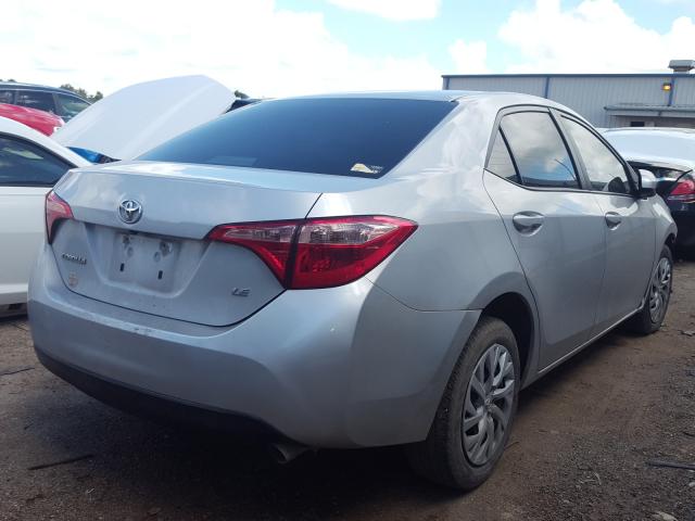 Photo 3 VIN: 5YFBURHE9JP793906 - TOYOTA COROLLA L 