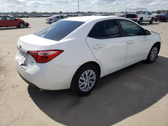 Photo 3 VIN: 5YFBURHE9JP796756 - TOYOTA COROLLA L 