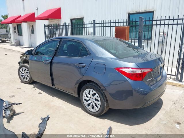 Photo 2 VIN: 5YFBURHE9JP797034 - TOYOTA COROLLA 