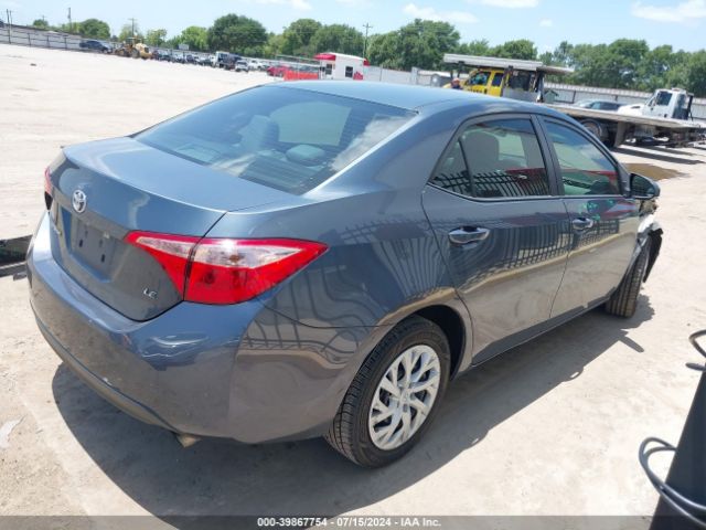 Photo 3 VIN: 5YFBURHE9JP797034 - TOYOTA COROLLA 