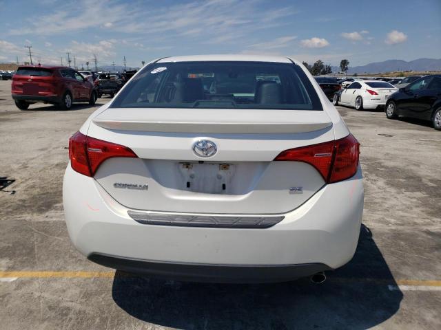 Photo 5 VIN: 5YFBURHE9JP801714 - TOYOTA COROLLA 