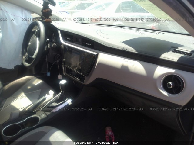 Photo 4 VIN: 5YFBURHE9JP802832 - TOYOTA COROLLA 