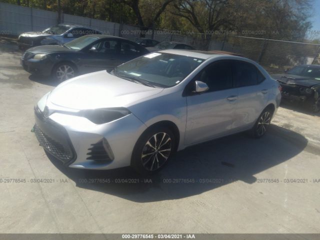 Photo 1 VIN: 5YFBURHE9JP807688 - TOYOTA COROLLA 