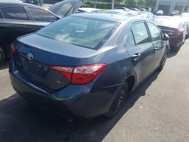 Photo 3 VIN: 5YFBURHE9JP808484 - TOYOTA COROLLA L 