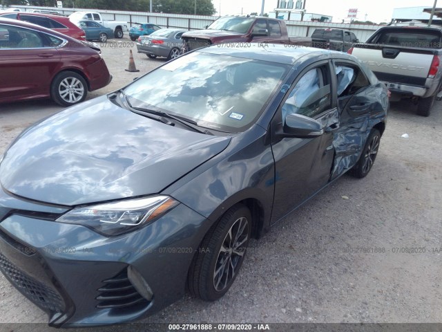 Photo 5 VIN: 5YFBURHE9JP812129 - TOYOTA COROLLA 