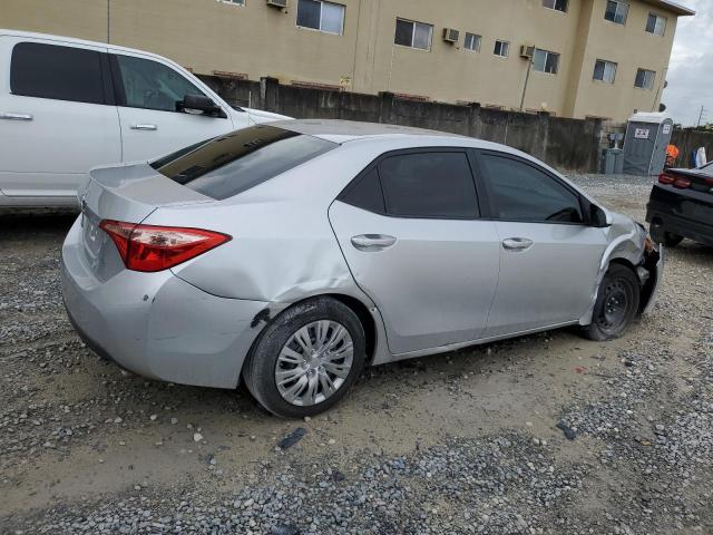 Photo 2 VIN: 5YFBURHE9JP815399 - TOYOTA COROLLA L 