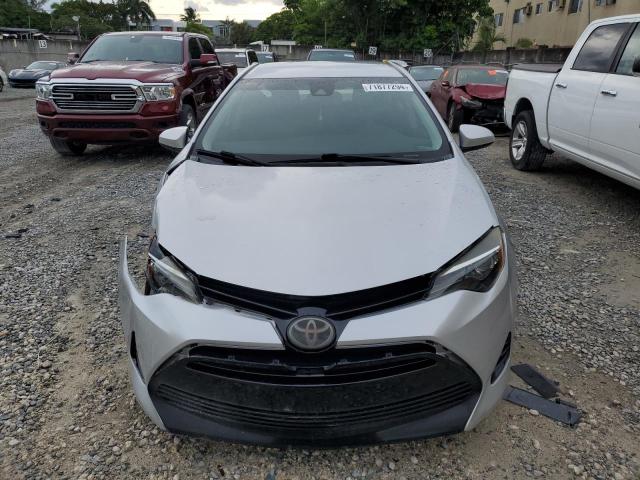 Photo 4 VIN: 5YFBURHE9JP815399 - TOYOTA COROLLA L 