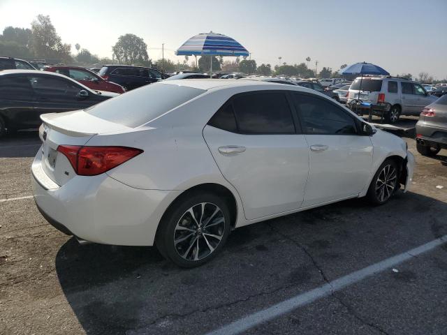 Photo 2 VIN: 5YFBURHE9JP828296 - TOYOTA COROLLA L 