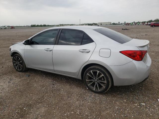 Photo 1 VIN: 5YFBURHE9JP831859 - TOYOTA COROLLA L 