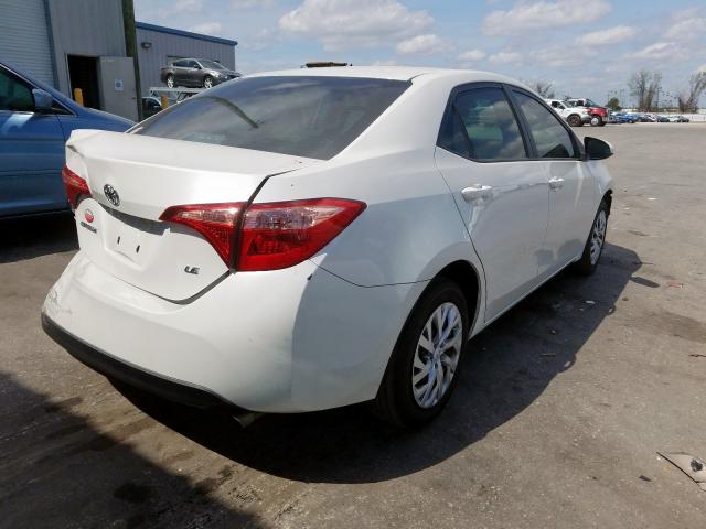 Photo 3 VIN: 5YFBURHE9JP832932 - TOYOTA COROLLA L 