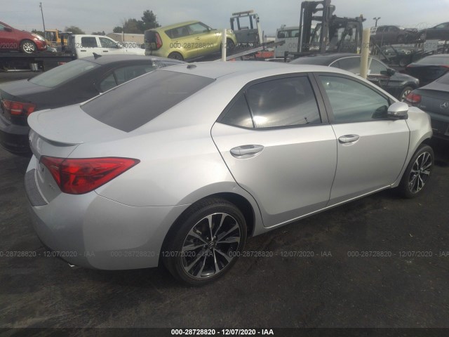 Photo 3 VIN: 5YFBURHE9JP835703 - TOYOTA COROLLA 