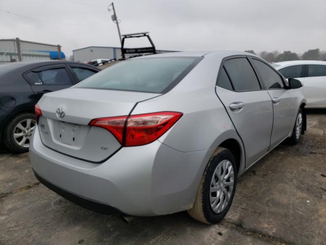 Photo 3 VIN: 5YFBURHE9JP843400 - TOYOTA COROLLA L 