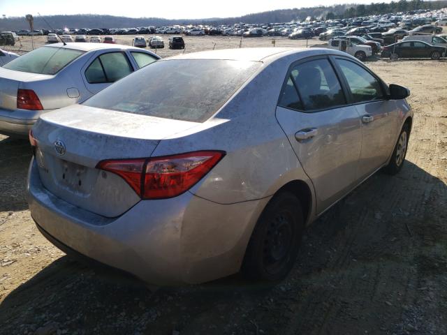 Photo 3 VIN: 5YFBURHE9JP844191 - TOYOTA COROLLA L 