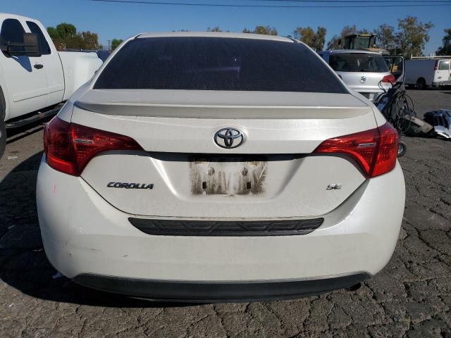 Photo 5 VIN: 5YFBURHE9JP844580 - TOYOTA COROLLA L 