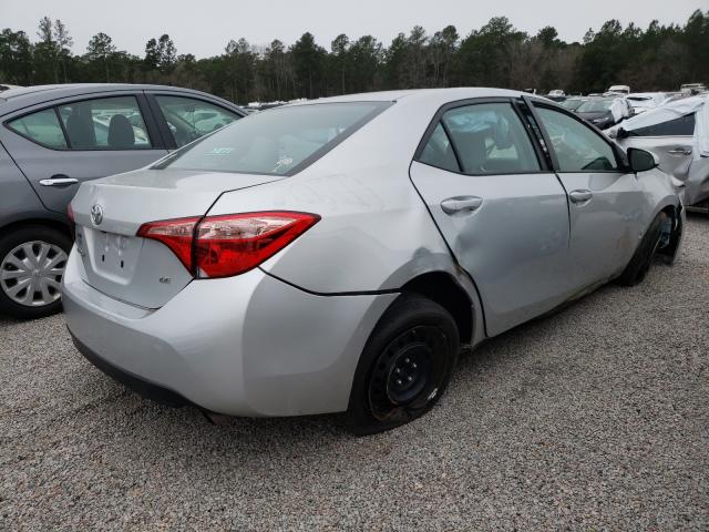 Photo 3 VIN: 5YFBURHE9JP849536 - TOYOTA COROLLA L 