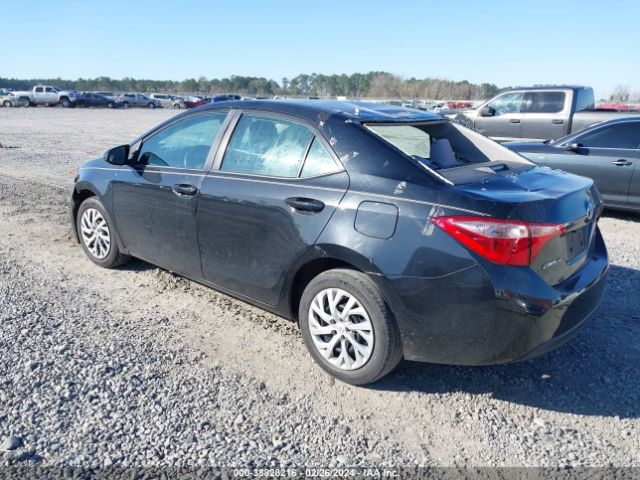 Photo 2 VIN: 5YFBURHE9JP853991 - TOYOTA COROLLA 