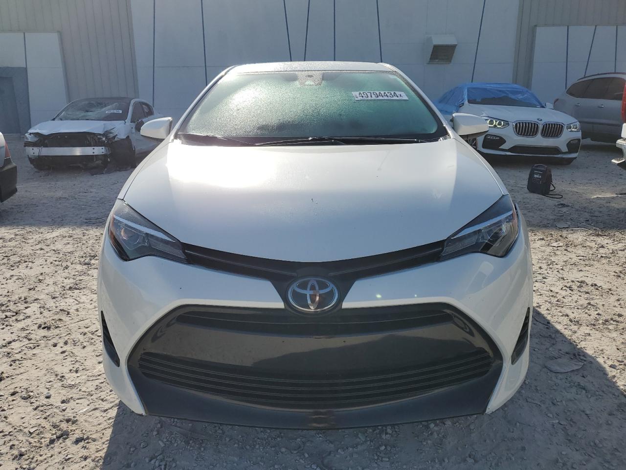 Photo 4 VIN: 5YFBURHE9KP856780 - TOYOTA COROLLA 