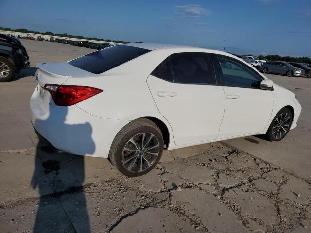 Photo 2 VIN: 5YFBURHE9KP857685 - TOYOTA COROLLA L 