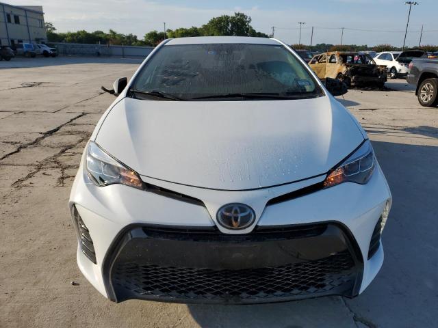 Photo 4 VIN: 5YFBURHE9KP857685 - TOYOTA COROLLA L 