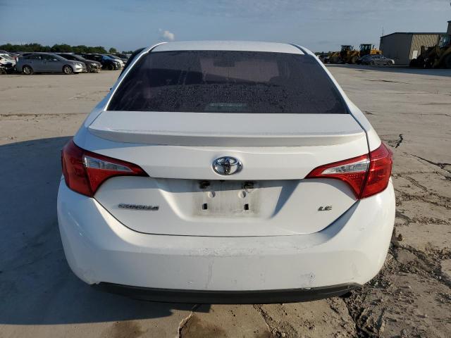 Photo 5 VIN: 5YFBURHE9KP857685 - TOYOTA COROLLA L 