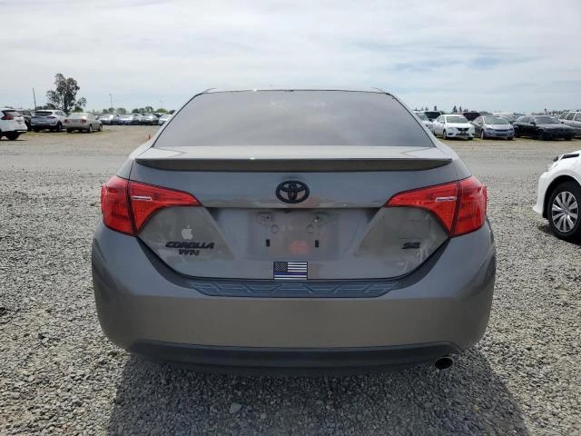 Photo 5 VIN: 5YFBURHE9KP858710 - TOYOTA COROLLA L 