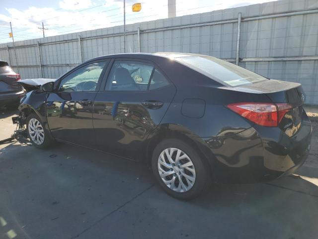 Photo 1 VIN: 5YFBURHE9KP861476 - TOYOTA COROLLA L 