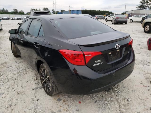 Photo 2 VIN: 5YFBURHE9KP861834 - TOYOTA COROLLA L 