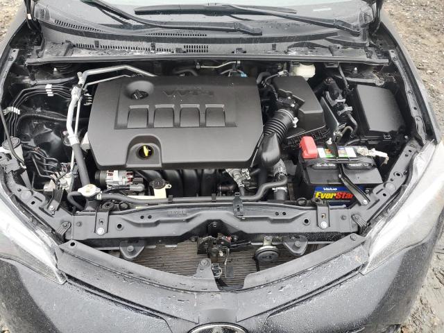 Photo 10 VIN: 5YFBURHE9KP862353 - TOYOTA COROLLA L 