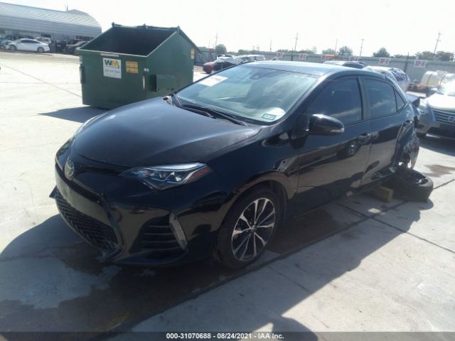 Photo 1 VIN: 5YFBURHE9KP865463 - TOYOTA COROLLA 