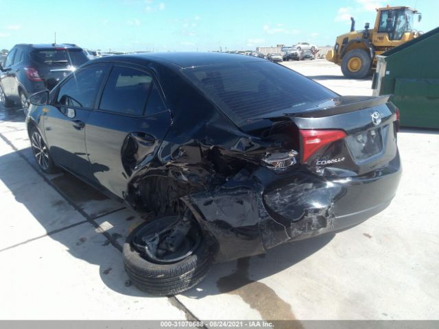 Photo 2 VIN: 5YFBURHE9KP865463 - TOYOTA COROLLA 