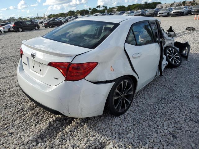 Photo 3 VIN: 5YFBURHE9KP865947 - TOYOTA COROLLA L 